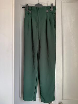 High waisted green trousers